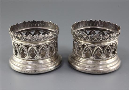 A pair of early Victorian pierced silver bottle coasters by Samuel Walker & Co, overall diameter 4.75in.